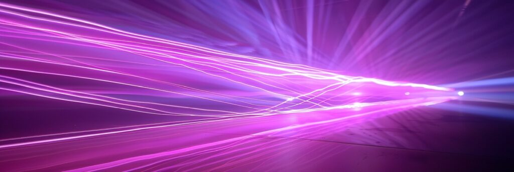 UV laser system operating, showcasing the laser beam cutting intricate patterns